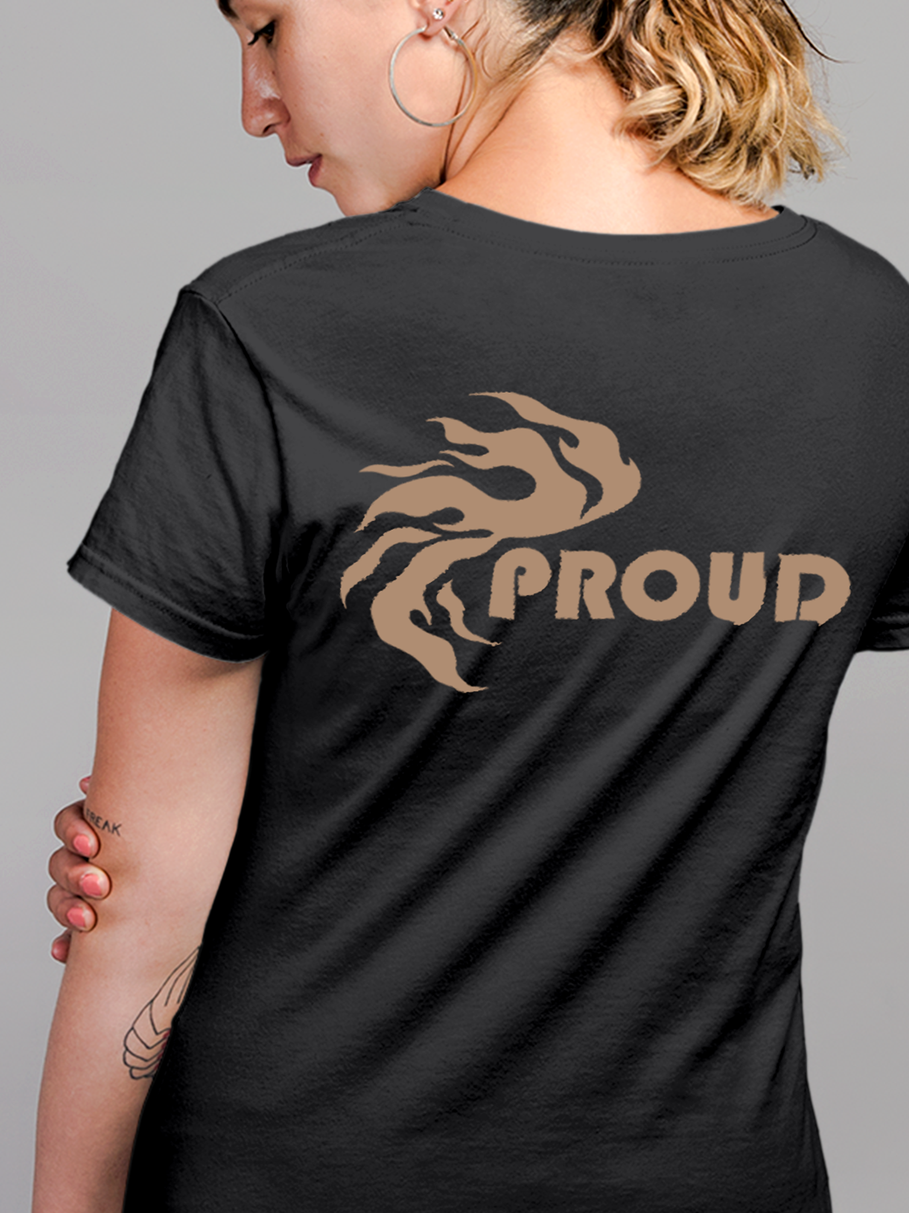 Close up of 'Proud' design on Women's Charcoal Grey Round Neck T-shirt, highlighting intricate details and vibrant print.