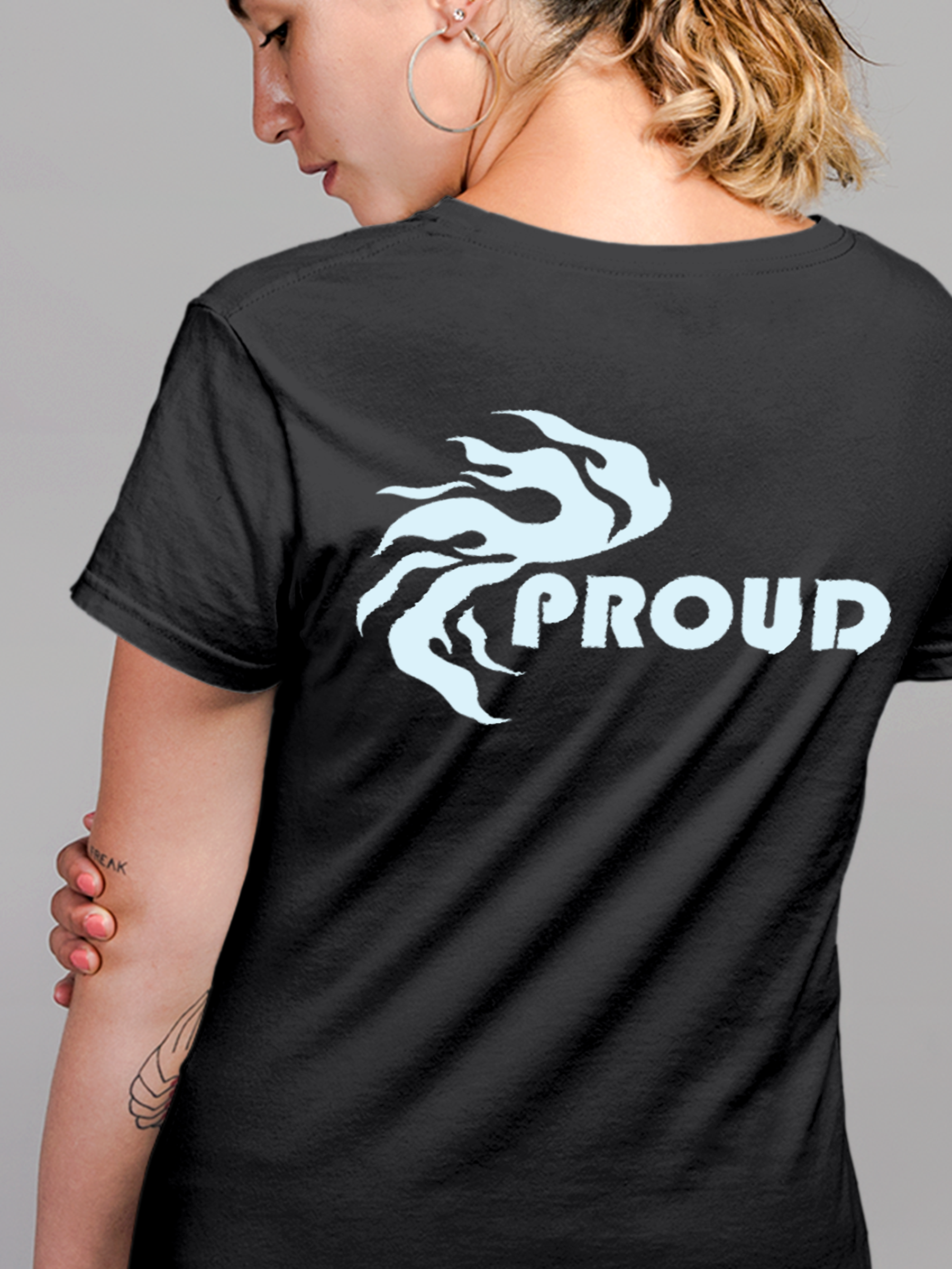 Close up of 'Proud' design on Women's Charcoal Grey Round Neck T-shirt, highlighting intricate details and vibrant print.