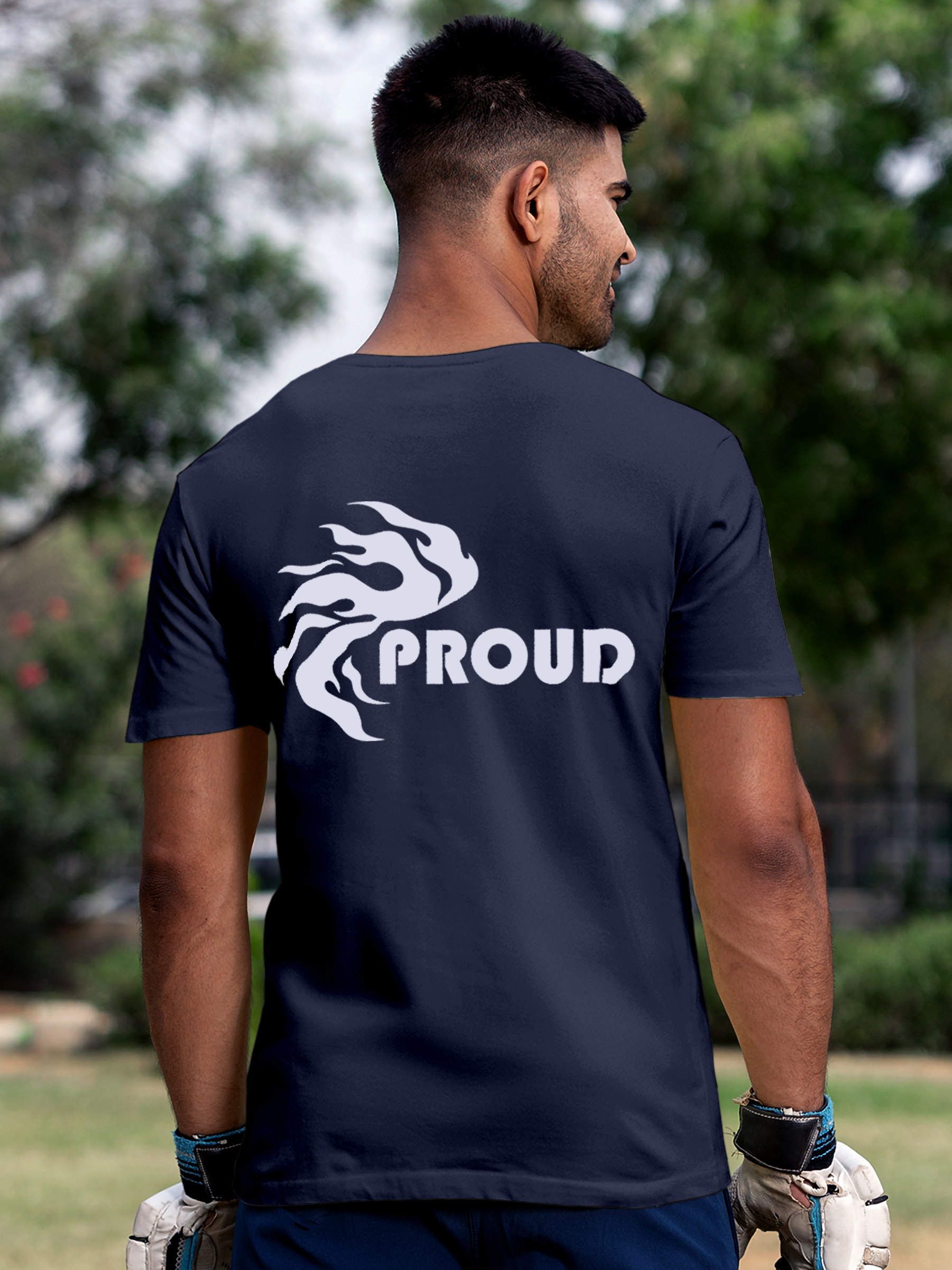 Model wearing Men's Navy Blue Round Neck T-shirt with 'Proud' design, offering effortless style and premium comfort