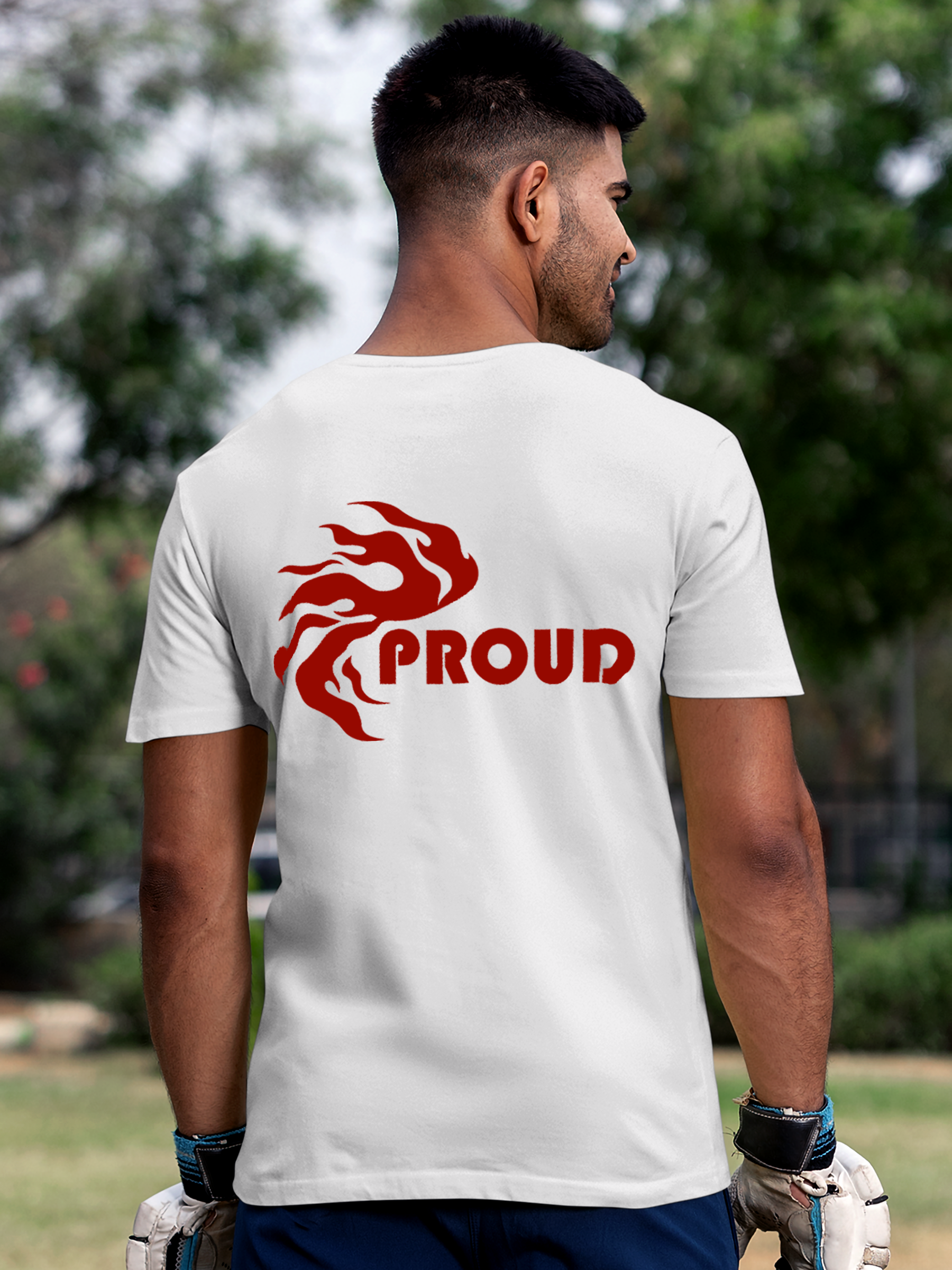Model wearing Men's White Round Neck T-shirt with 'Proud' design, offering effortless style and premium comfort