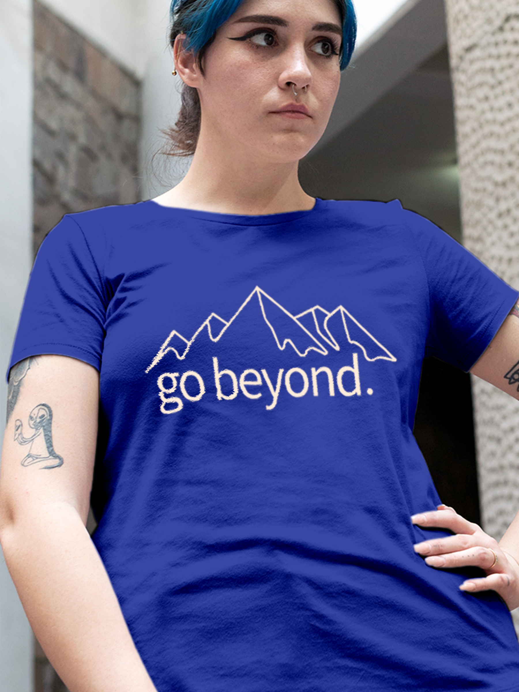 Close up of 'Go Beyond' design on Women's Blue Round Neck T-shirt, highlighting intricate details and vibrant print.