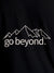 Close up of 'Go Beyond' design on Men's Black Round Neck T-shirt, highlighting intricate details and vibrant print.