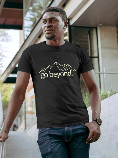 Model wearing Men's Dark Grey Round Neck T-shirt with 'Go Beyond' design, offering effortless style and premium comfort