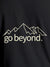 Close up of 'Go Beyond' design on Men's Dark Grey Round Neck T-shirt, highlighting intricate details and vibrant print.