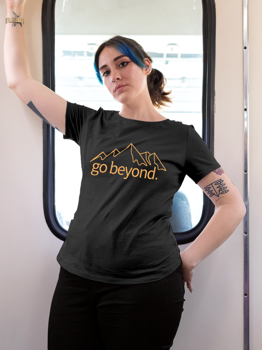 Fighterhero T-shirts: Model wearing Women's Charcoal Grey Round Neck T-shirt with 'Go Beyond' design