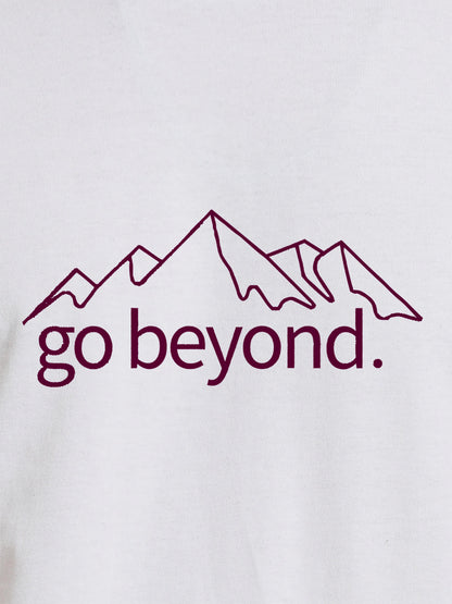 Close up of 'Go Beyond' design on Women's White Round Neck T-shirt, highlighting intricate details and vibrant print.