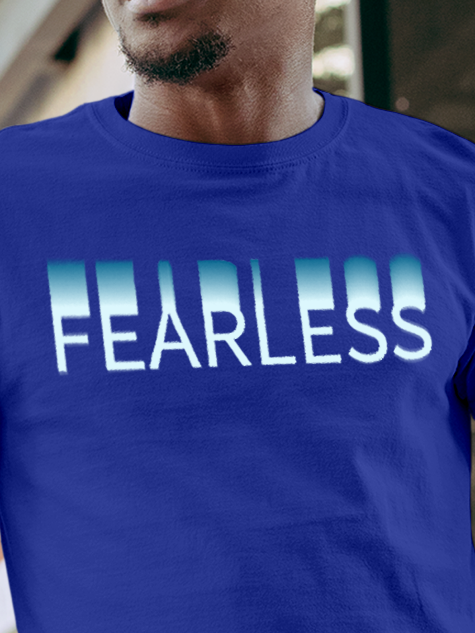 Close up of 'Fearless' design on Men's Blue Round Neck T-shirt, highlighting intricate details and vibrant print.