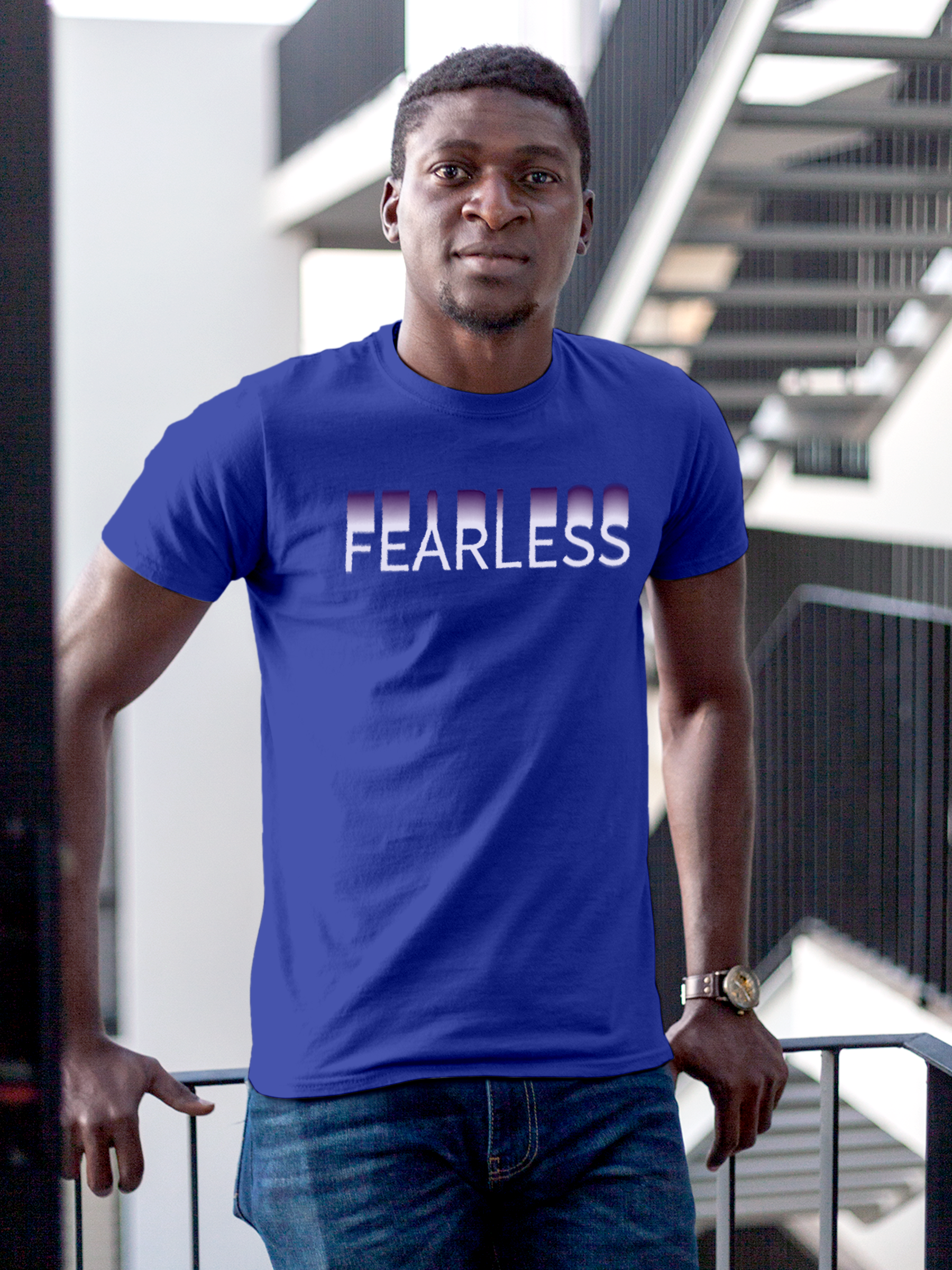 Model wearing Men's Blue Round Neck T-shirt with 'Fearless' design, offering effortless style and premium comfort