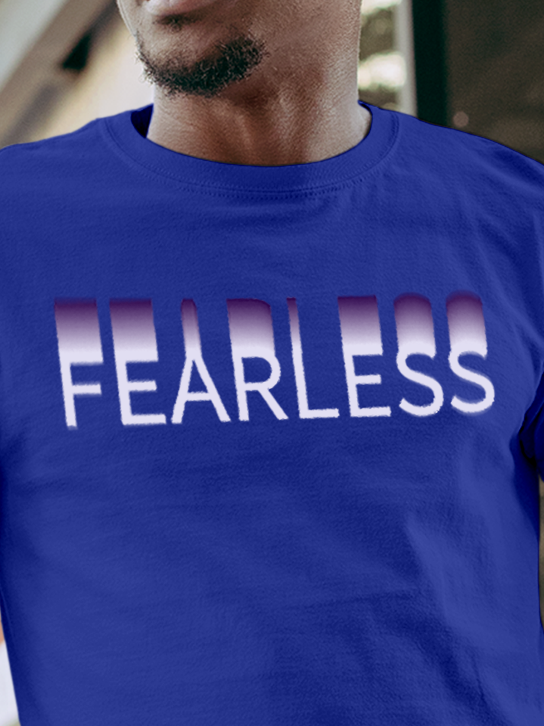 Close up of 'Fearless' design on Men's Blue Round Neck T-shirt, highlighting intricate details and vibrant print.