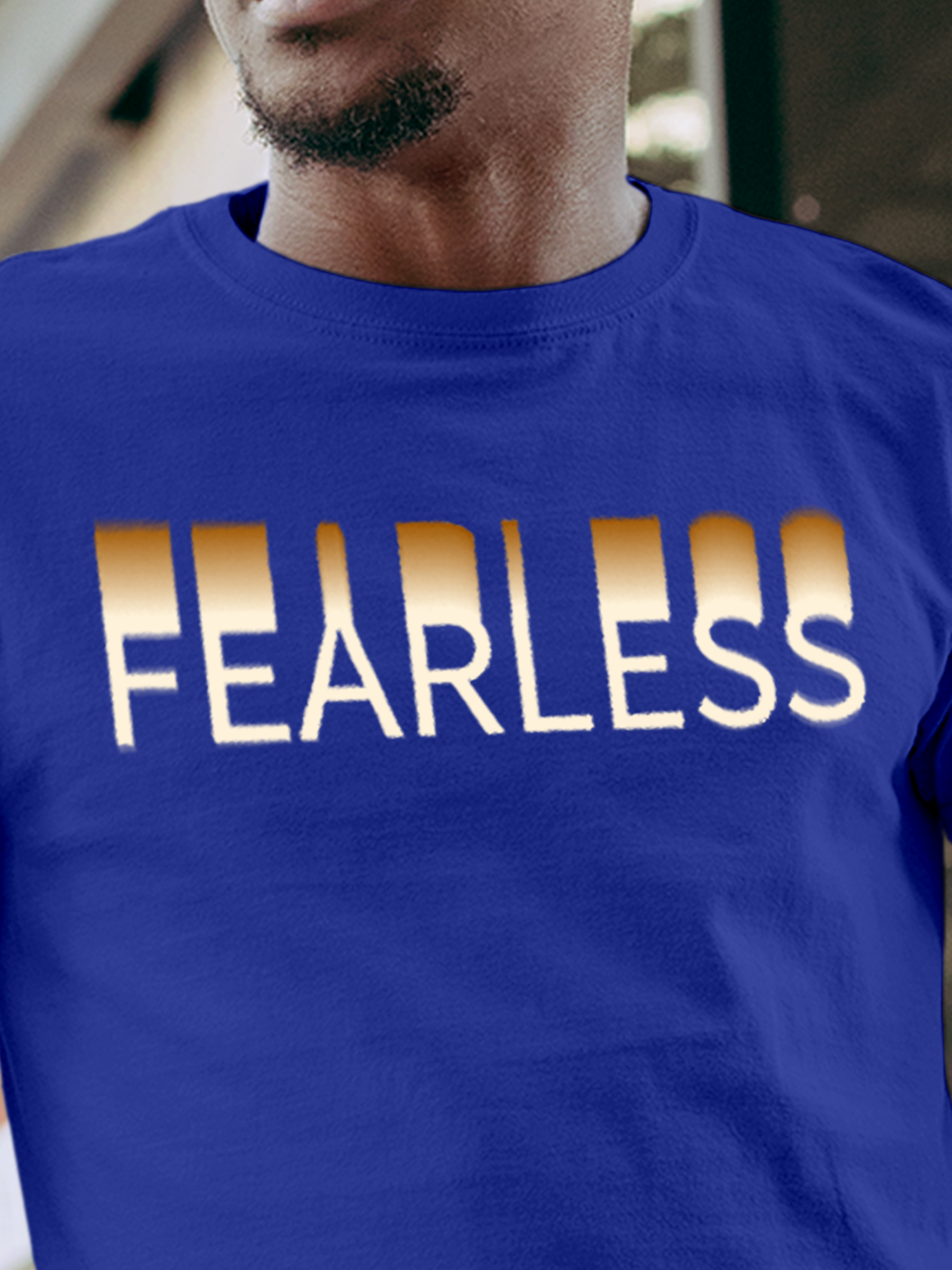 Close up of 'Fearless' design on Men's Blue Round Neck T-shirt, highlighting intricate details and vibrant print.