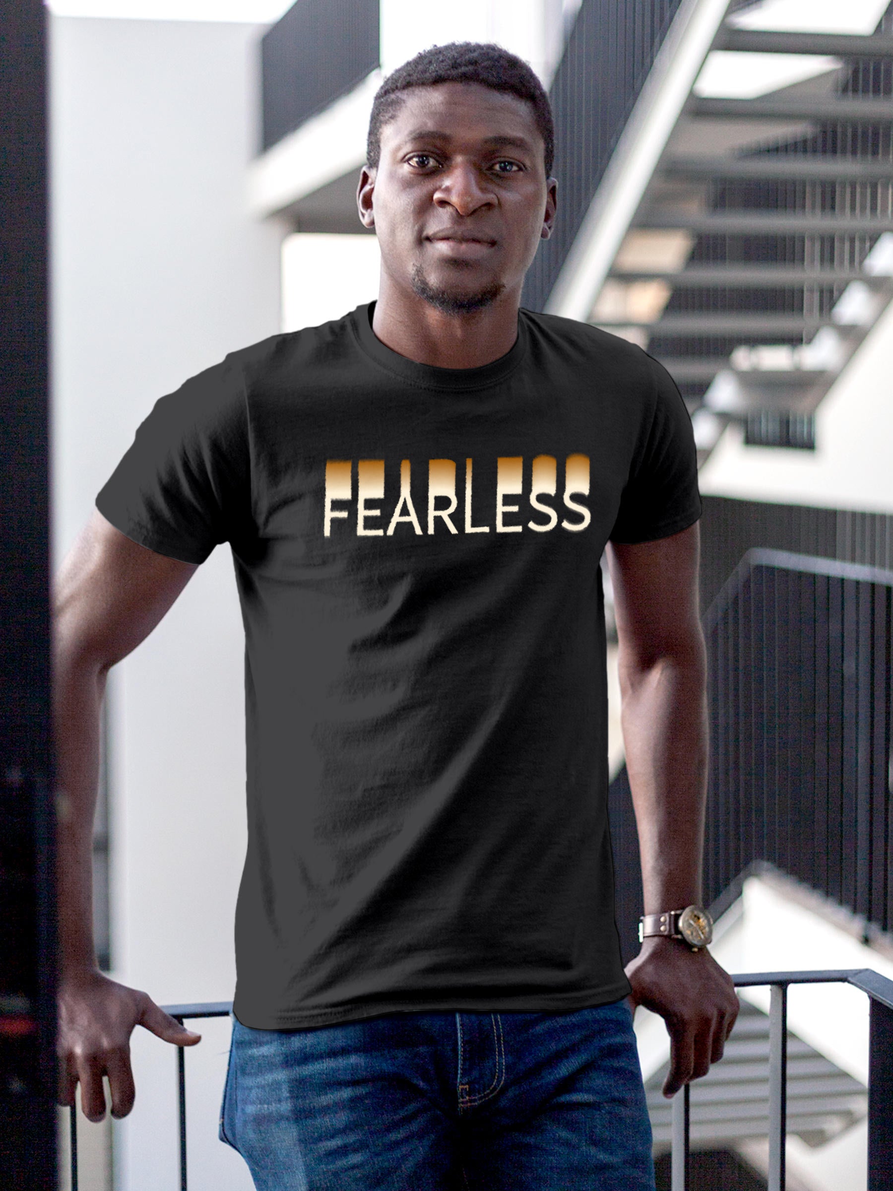 Model wearing Men's Dark Grey Round Neck T-shirt with 'Fearless' design, offering effortless style and premium comfort