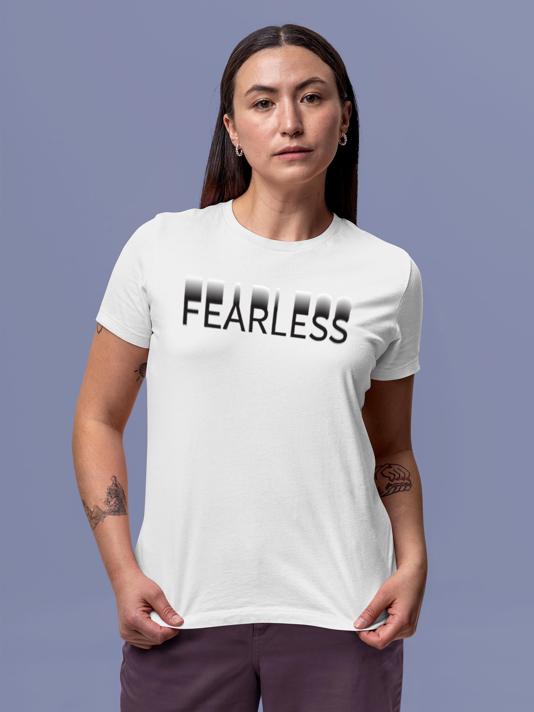 Model wearing Women's White Round Neck T-shirt with 'Fearless' design, offering effortless style and premium comfort
