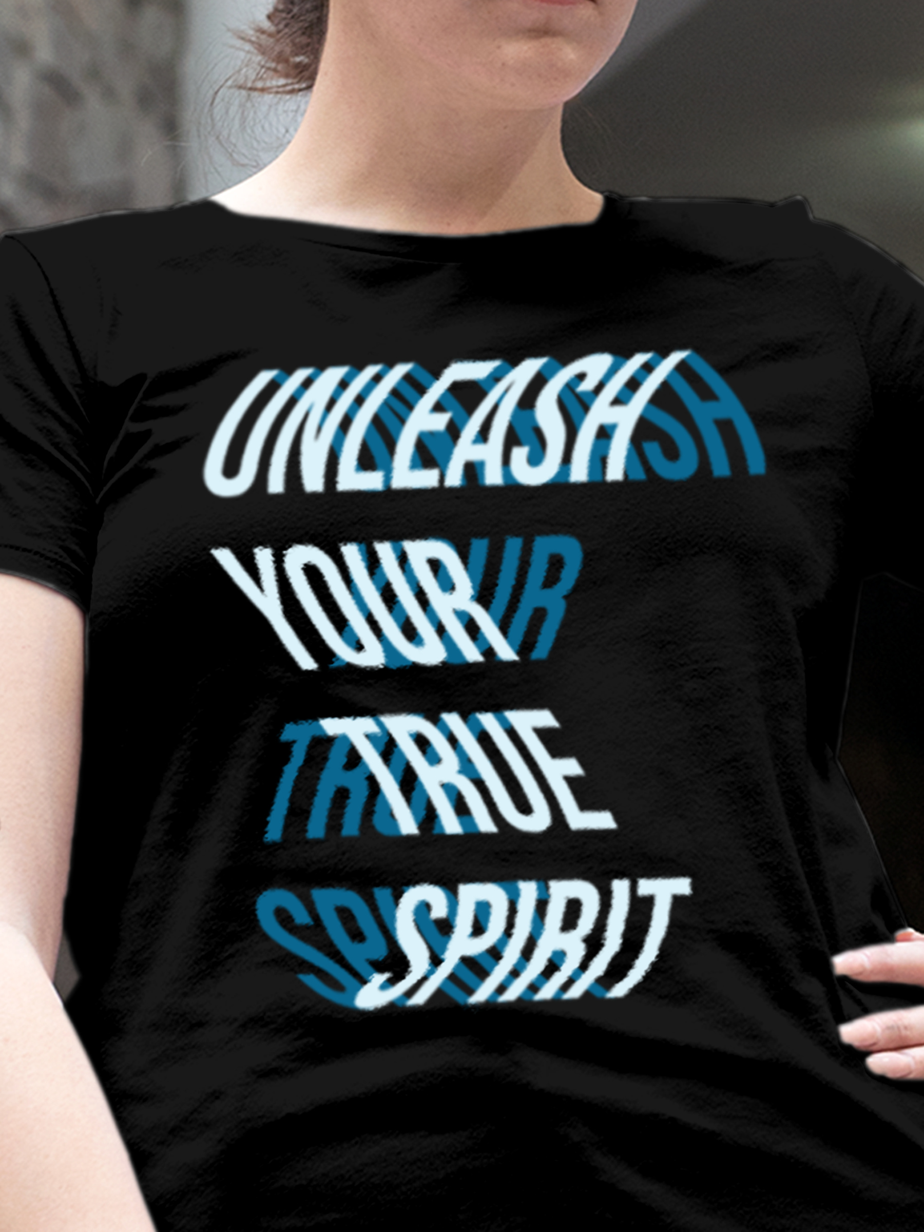 Close up of 'Unleash Your True Spirit' design on Women's Black Round Neck T-shirt, highlighting intricate details and vibrant print.