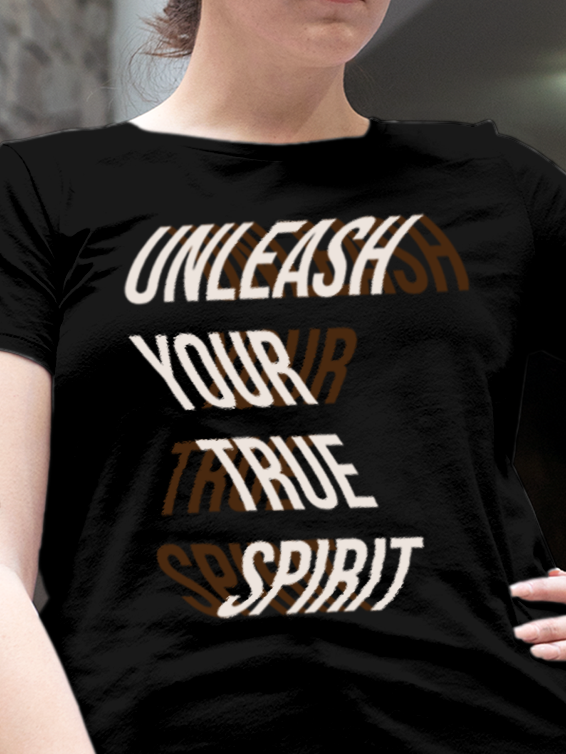 Close up of 'Unleash Your True Spirit' design on Women's Black Round Neck T-shirt, highlighting intricate details and vibrant print.