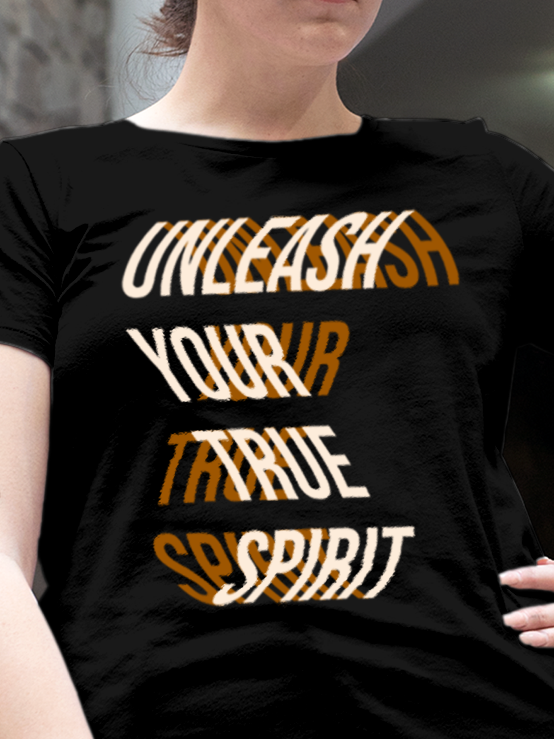 Close up of 'Unleash Your True Spirit' design on Women's Black Round Neck T-shirt, highlighting intricate details and vibrant print.