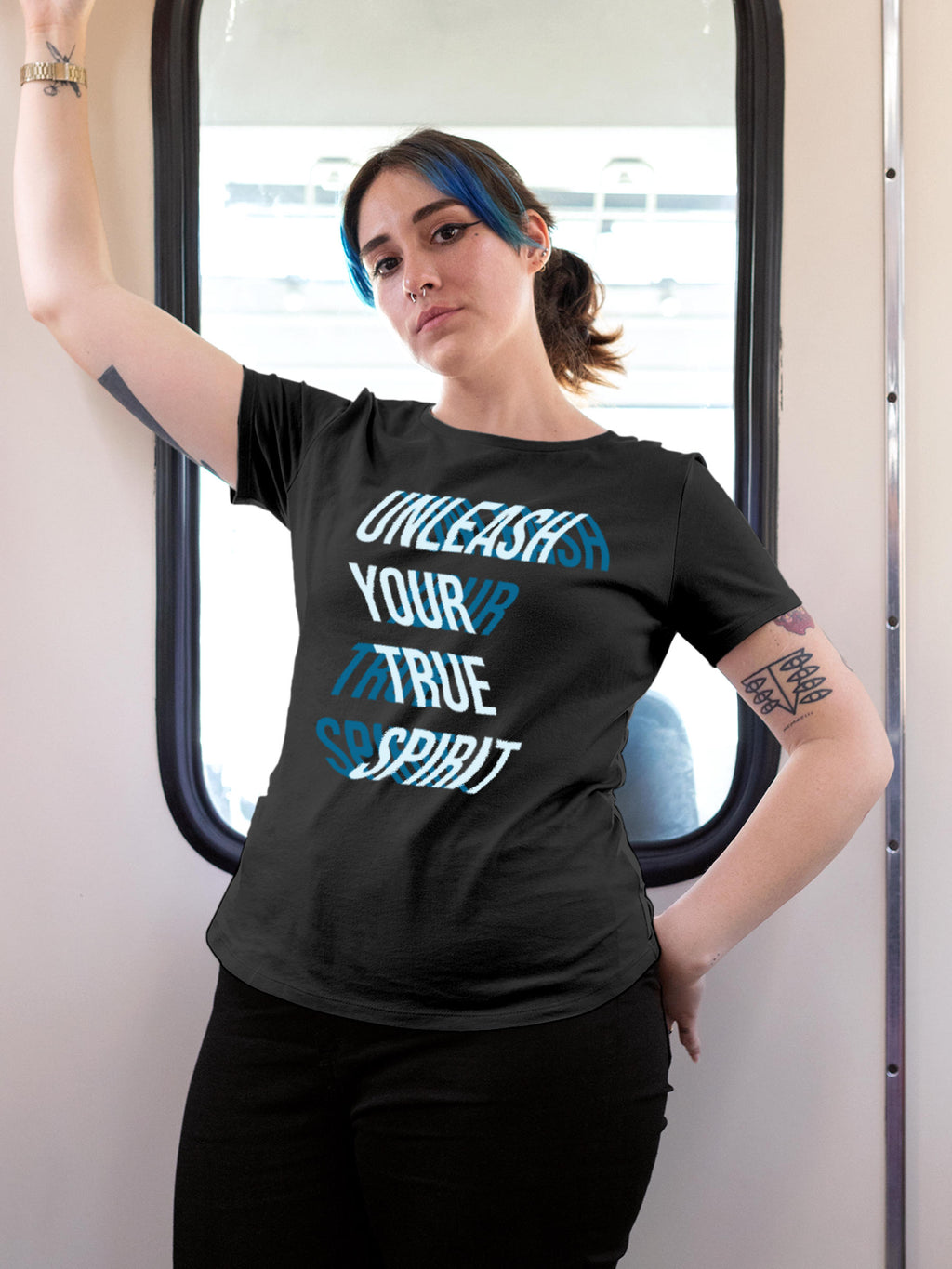 Model wearing Women's Dark Grey Round Neck T-shirt with 'Unleash Your True Spirit' design, offering effortless style and premium comfort