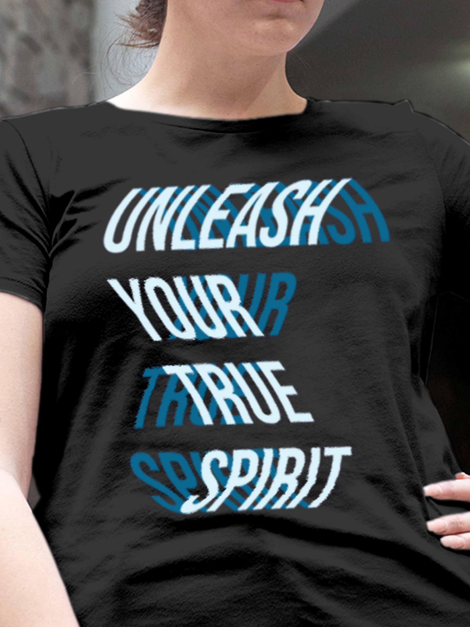 Close up of 'Unleash Your True Spirit' design on Women's Dark Grey Round Neck T-shirt, highlighting intricate details and vibrant print.