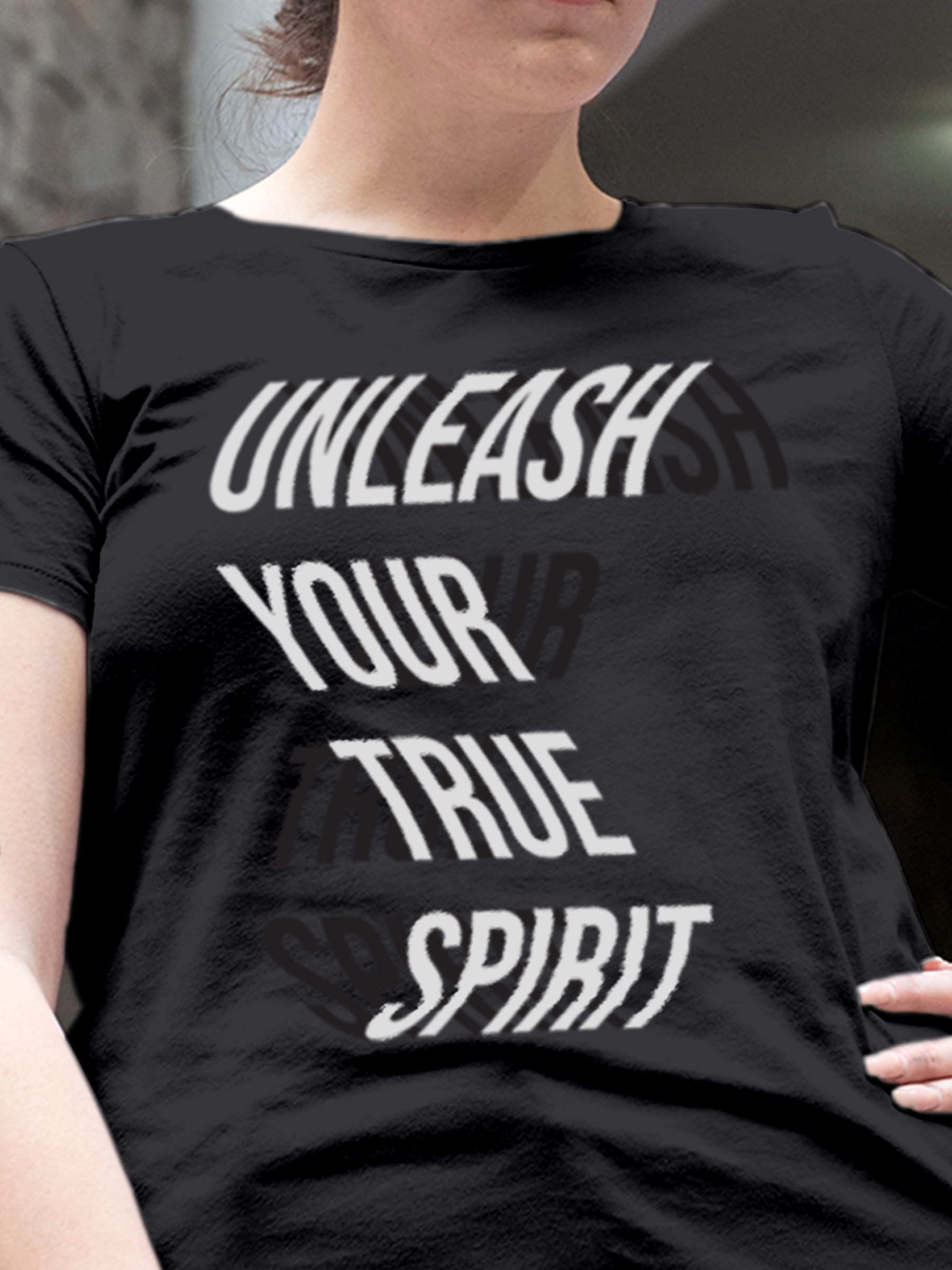 Close up of 'Unleash Your True Spirit' design on Women's Dark Grey Round Neck T-shirt, highlighting intricate details and vibrant print.