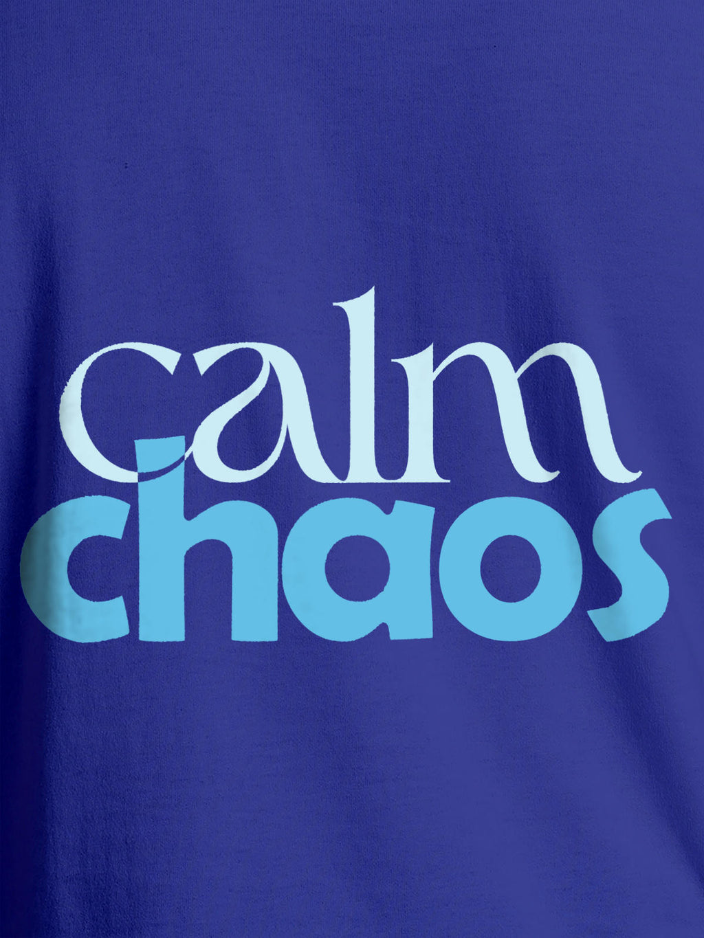 Close up of 'Calm Chaos' design on Women's Blue Round Neck T-shirt, highlighting intricate details and vibrant print.