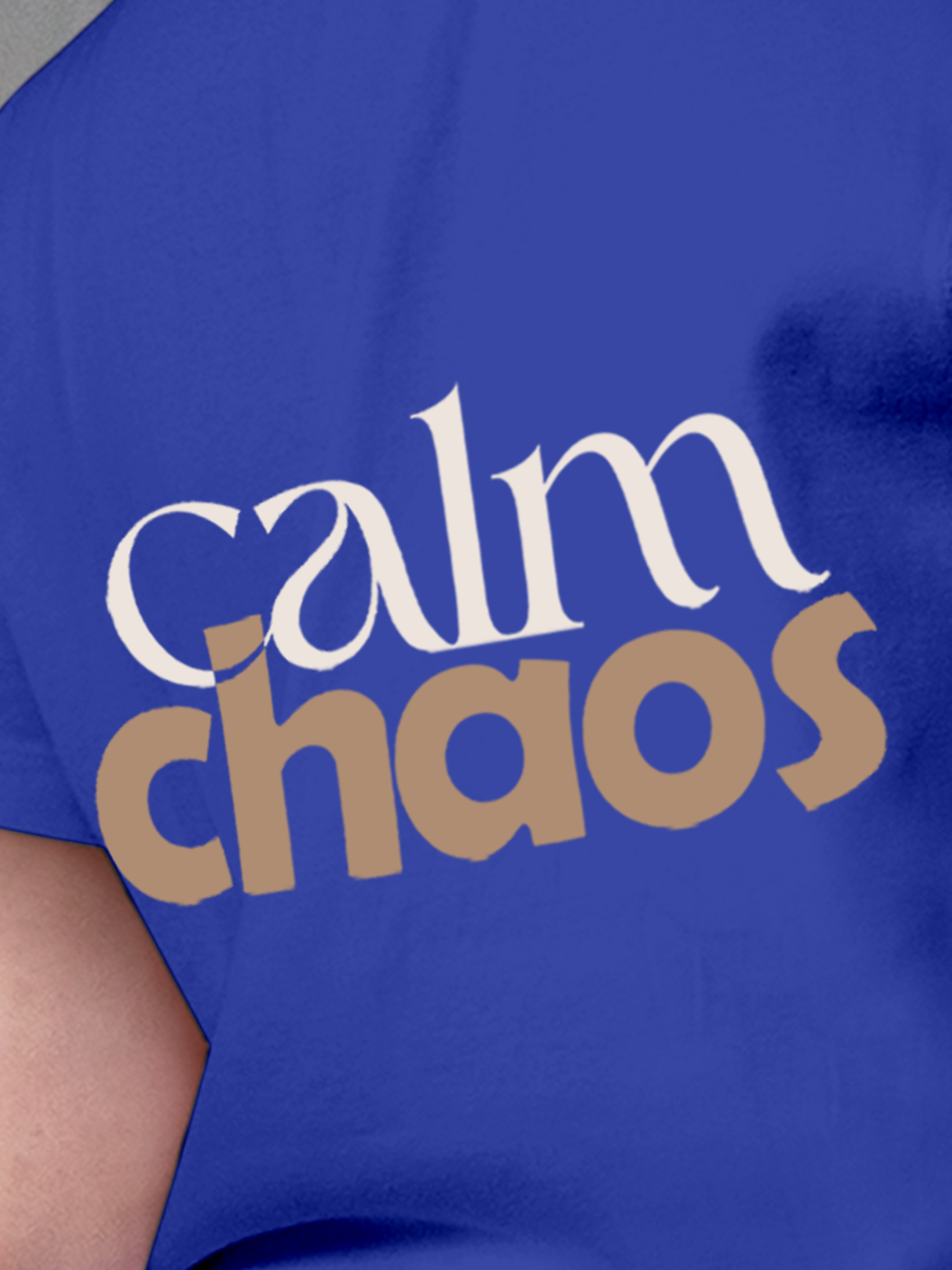 Close up of 'Calm Chaos' design on Women's Blue Round Neck T-shirt, highlighting intricate details and vibrant print.