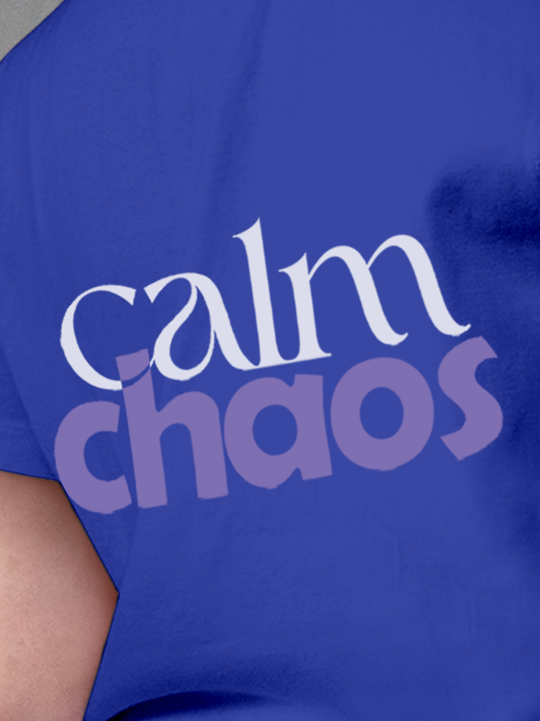 Close up of 'Calm Chaos' design on Women's Blue Round Neck T-shirt, highlighting intricate details and vibrant print.