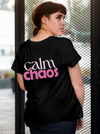 Model wearing Women's Black Round Neck T-shirt with 'Calm Chaos' design, offering effortless style and premium comfort
