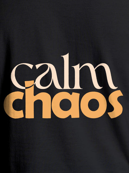 Close up of 'Calm Chaos' design on Women's Dark Grey Round Neck T-shirt, highlighting intricate details and vibrant print.