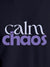 Close up of 'Calm Chaos' design on Men's Navy Blue Round Neck T-shirt, highlighting intricate details and vibrant print.
