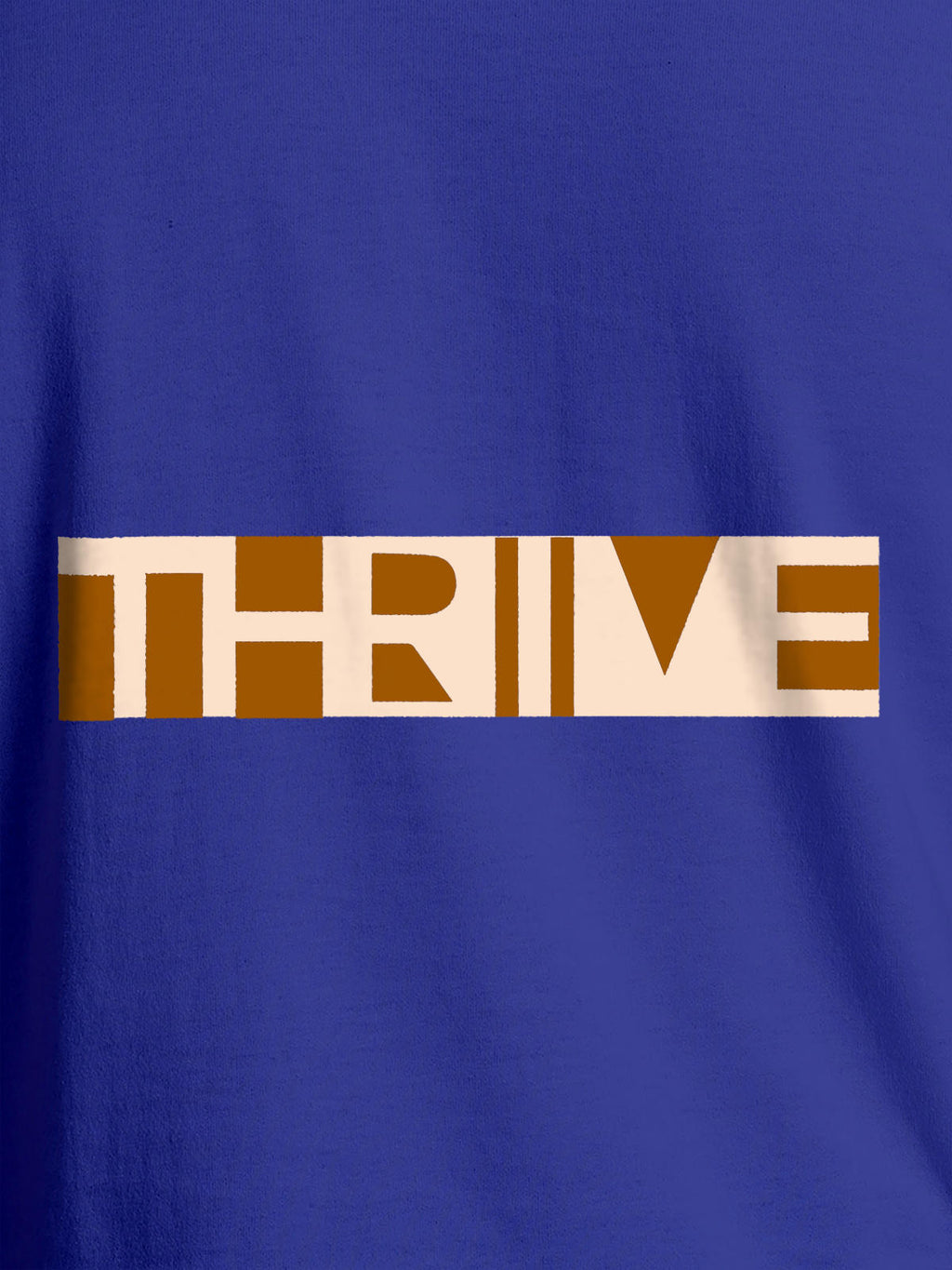 Close up of 'Thrive' design on Women's Blue Round Neck T-shirt, highlighting intricate details and vibrant print.