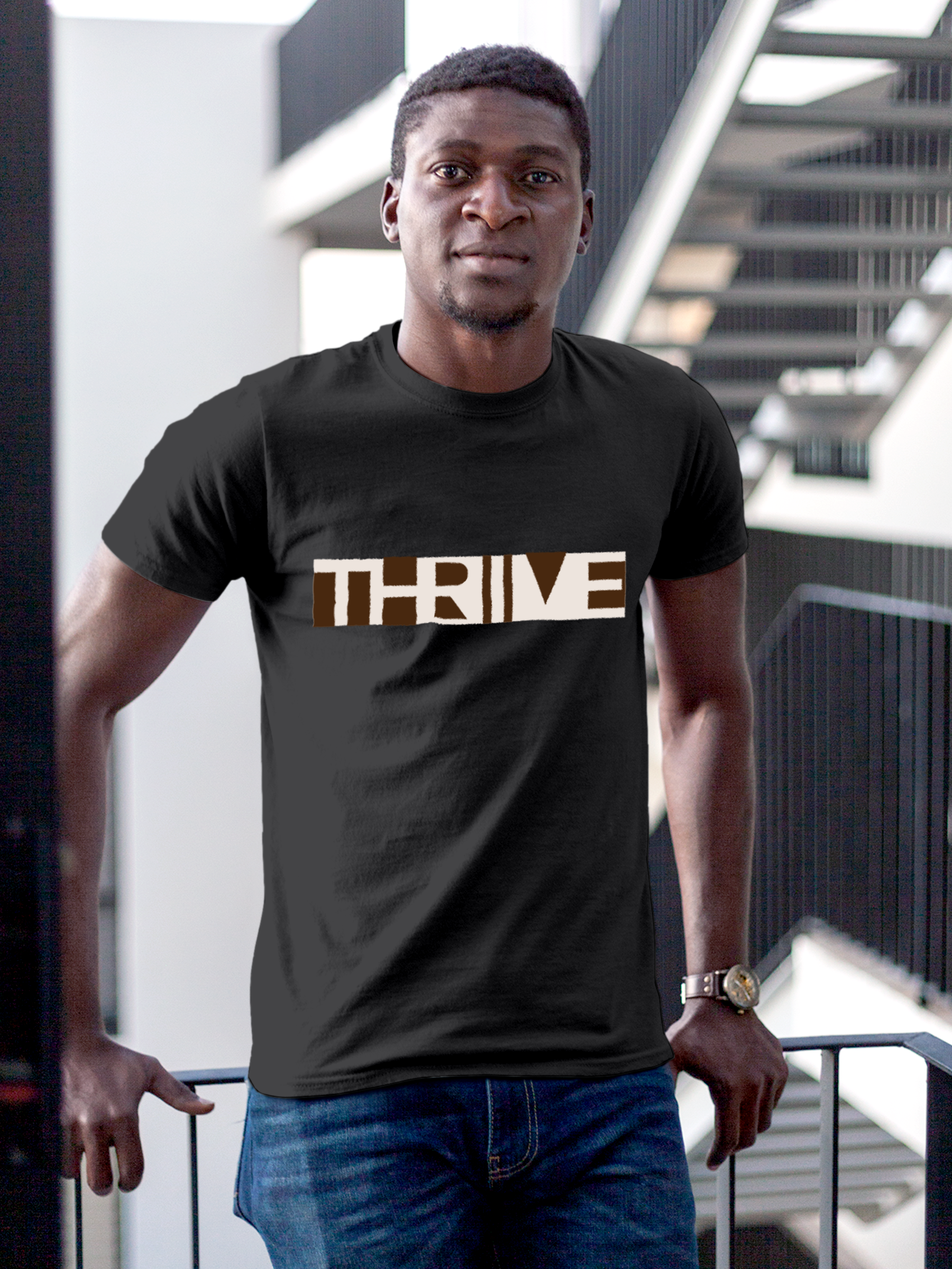 Model wearing Men's Dark Grey Round Neck T-shirt with 'Thrive' design, offering effortless style and premium comfort