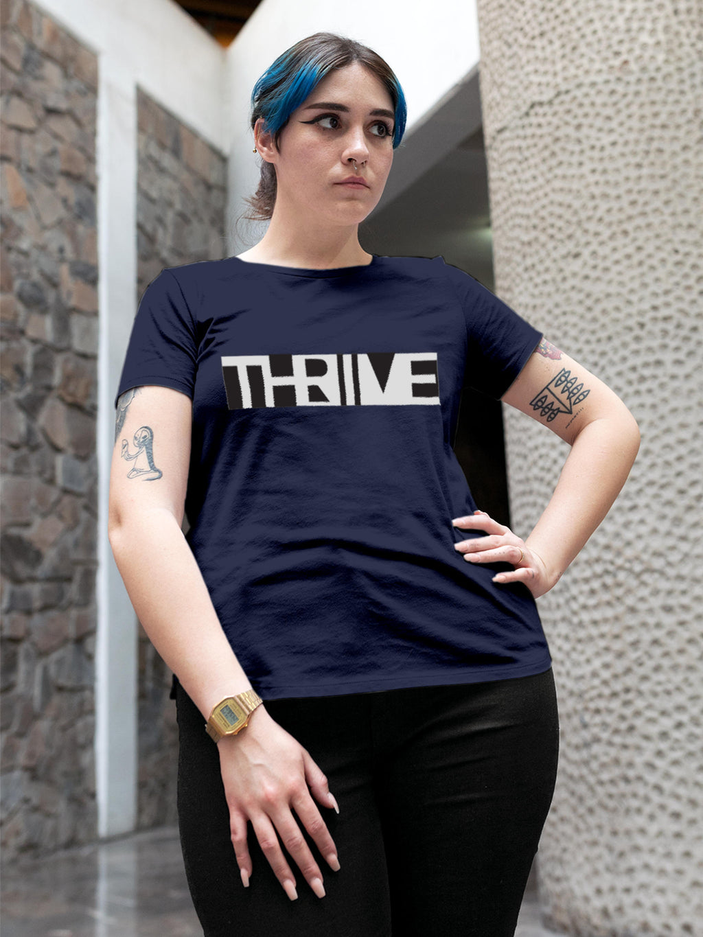 Model wearing Women's Navy Blue Round Neck T-shirt with 'Thrive' design, offering effortless style and premium comfort