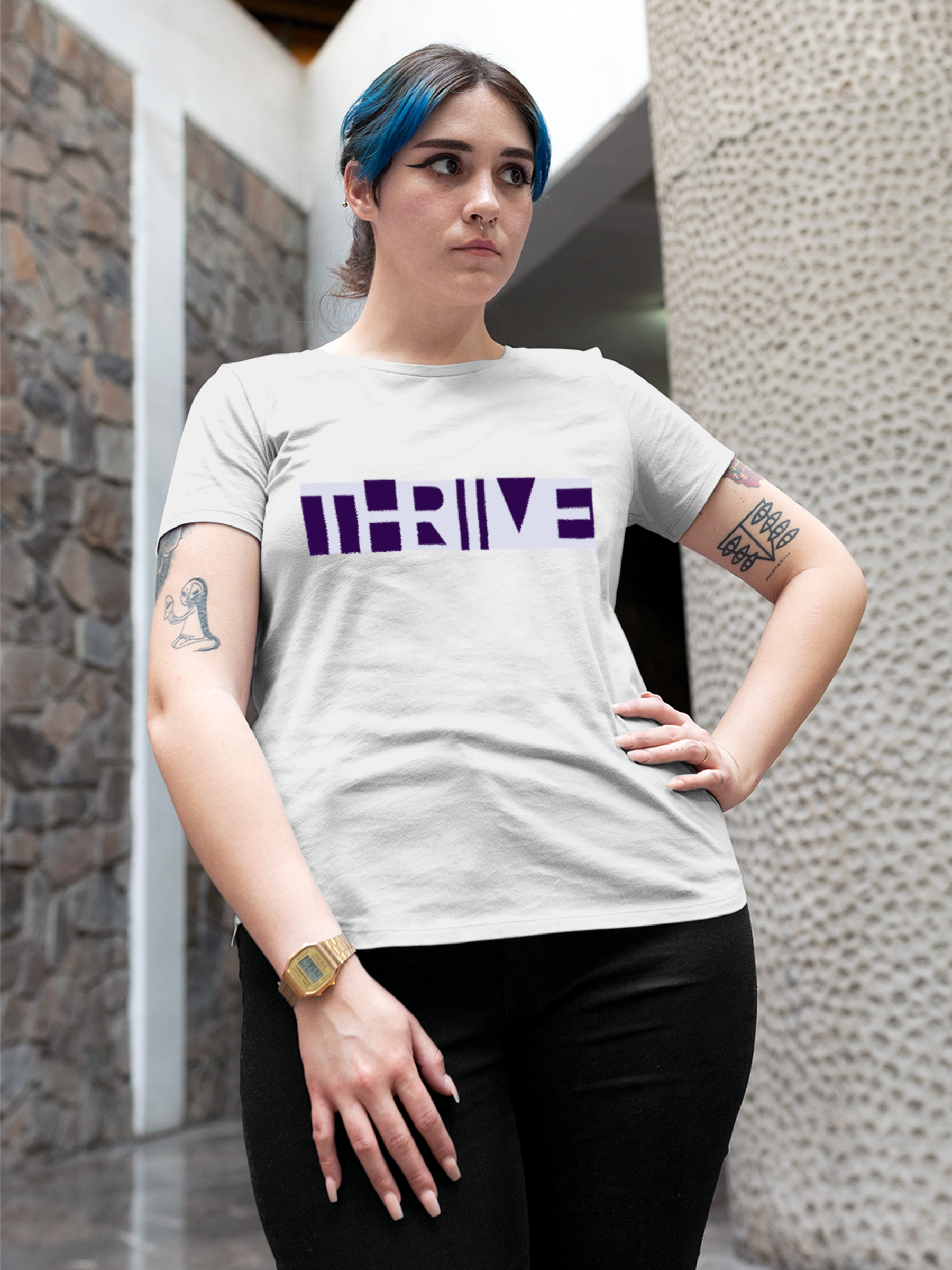 Model wearing Women's White Round Neck T-shirt with 'Thrive' design, offering effortless style and premium comfort