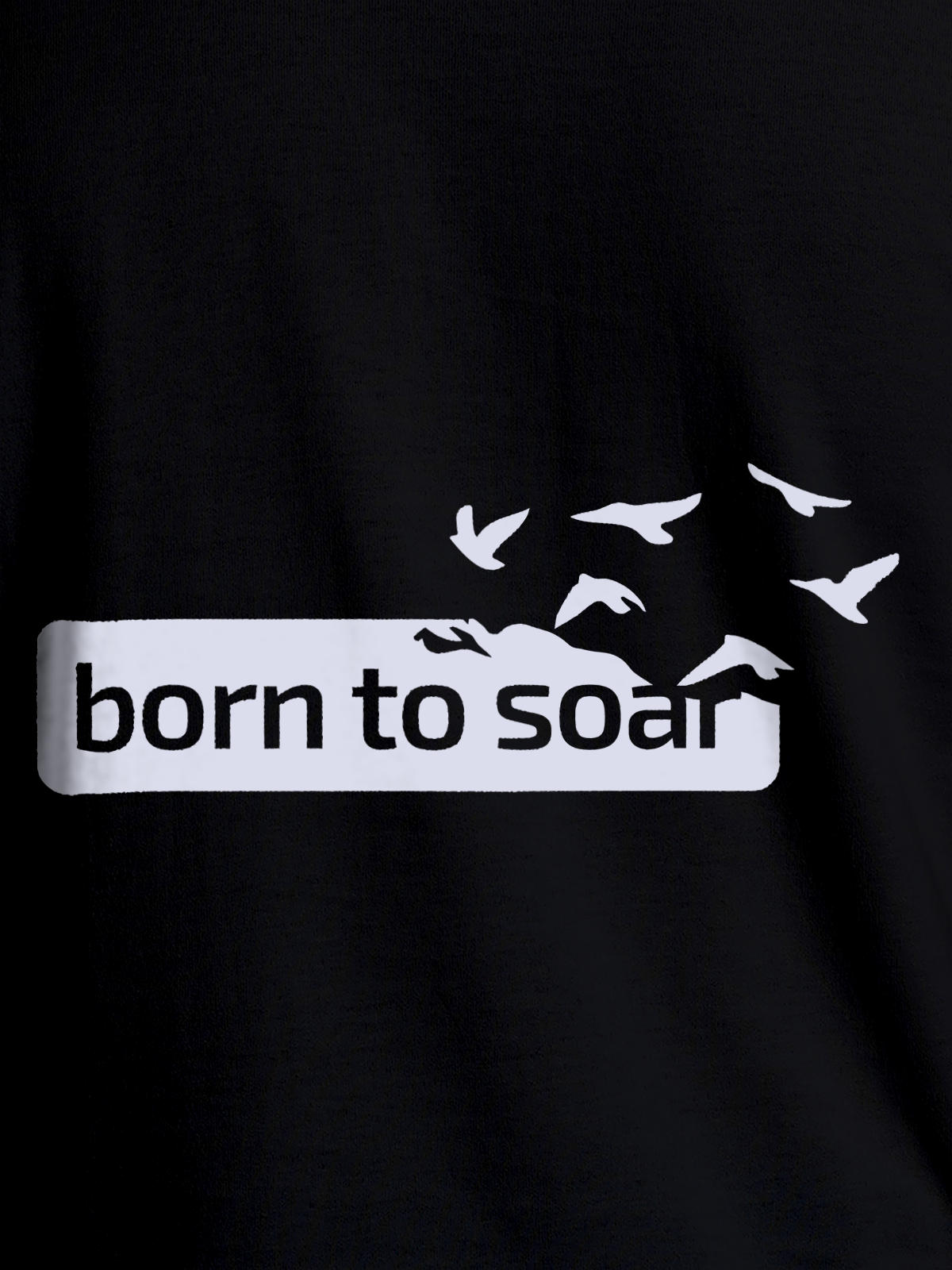 Close up of 'Born To Soar' design on Women's Black Round Neck T-shirt, highlighting intricate details and vibrant print.