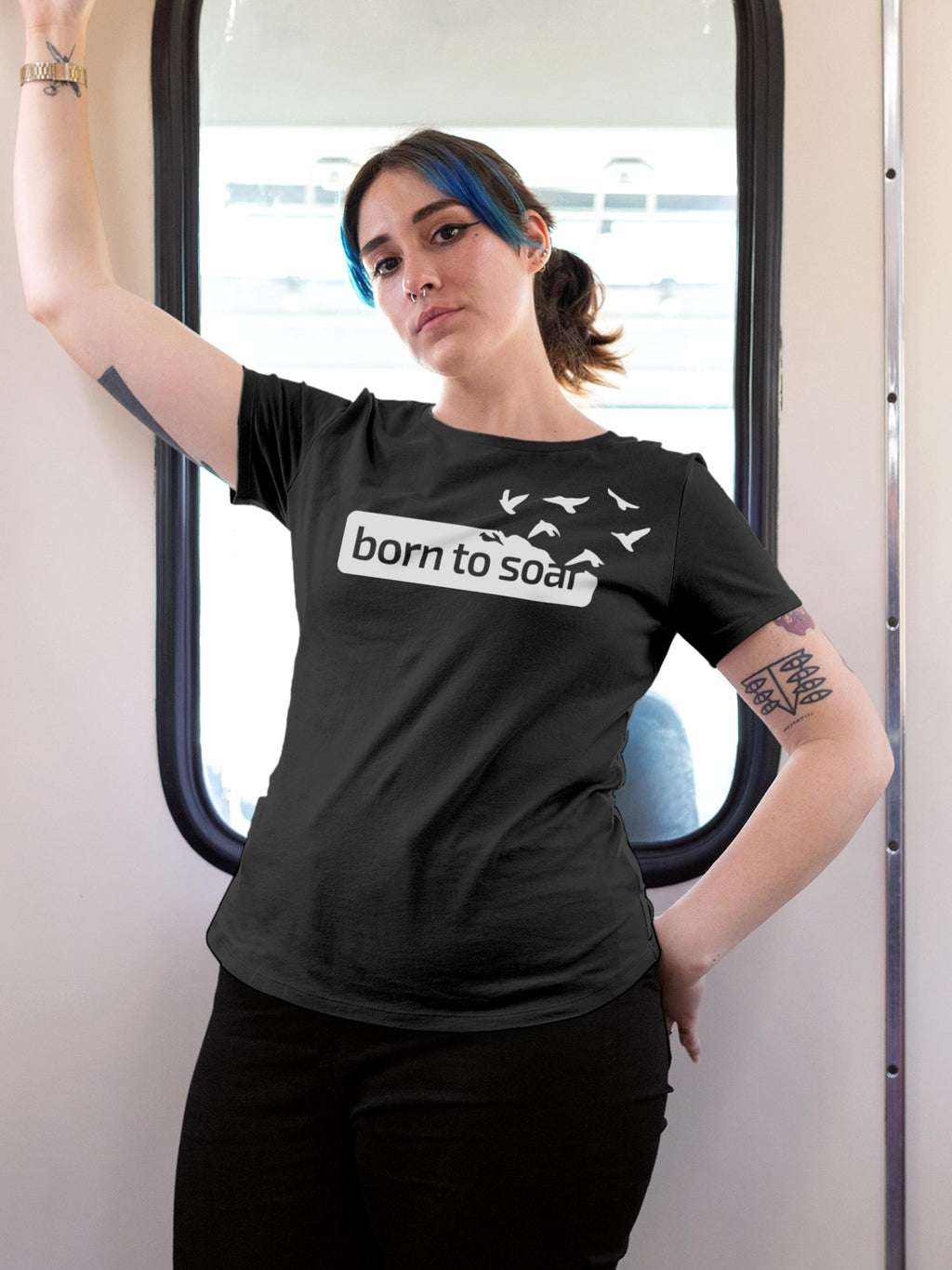 Model wearing Women's Dark Grey Round Neck T-shirt with 'Born To Soar' design, offering effortless style and premium comfort