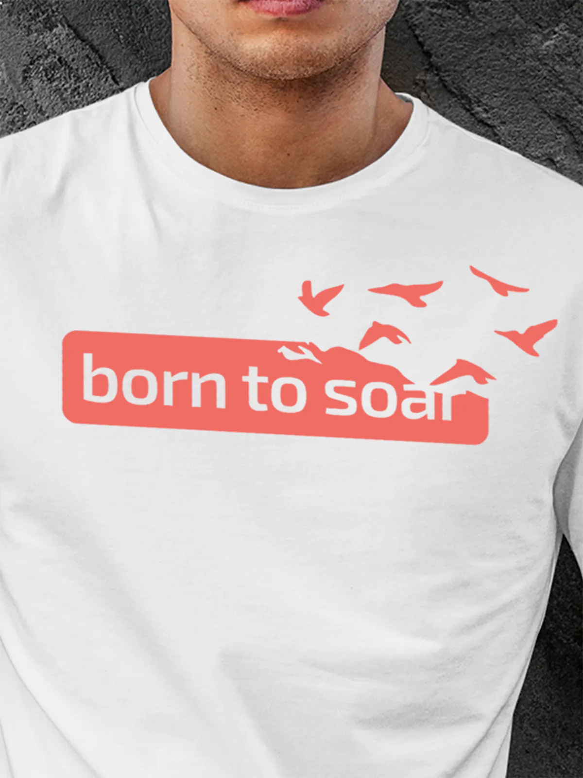 Close up of 'Born To Soar' design on Men's White Round Neck T-shirt, highlighting intricate details and vibrant print.