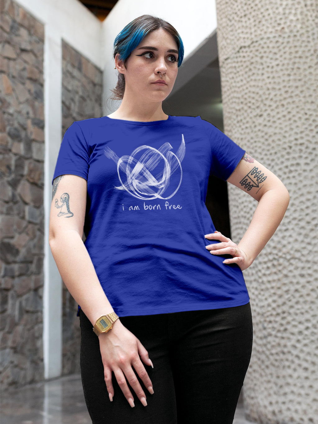 Model wearing Women's Blue Round Neck T-shirt with 'Born Free' design, offering effortless style and premium comfort