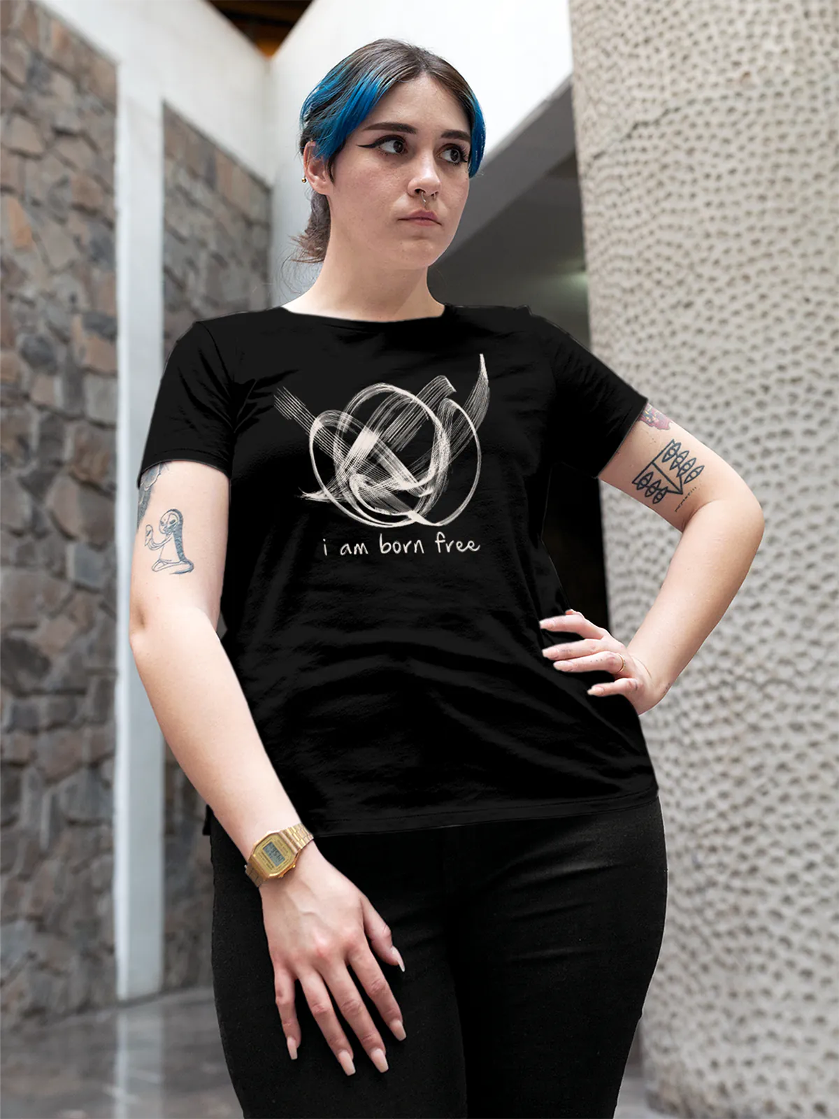 Model wearing Women's Black Round Neck T-shirt with 'Born Free' design, offering effortless style and premium comfort