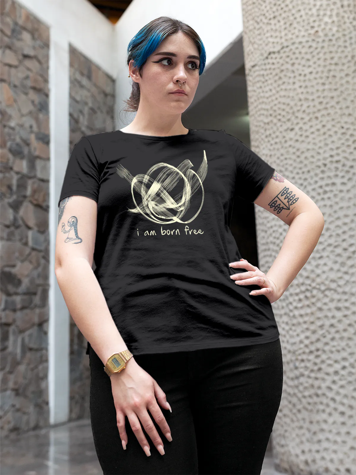 Model wearing Women's Dark Grey Round Neck T-shirt with 'Born Free' design, offering effortless style and premium comfort
