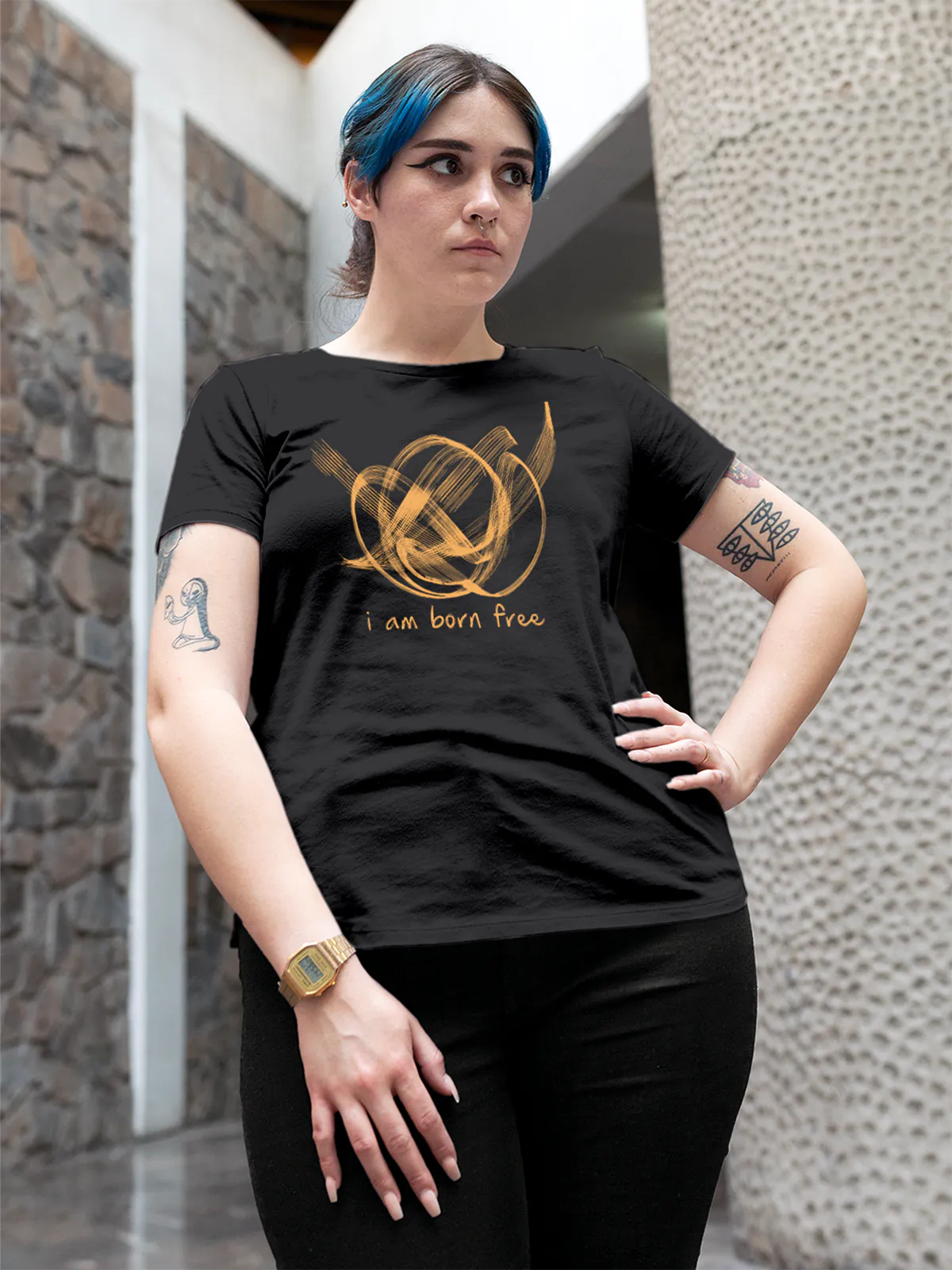 Model wearing Women's Dark Grey Round Neck T-shirt with 'Born Free' design, offering effortless style and premium comfort