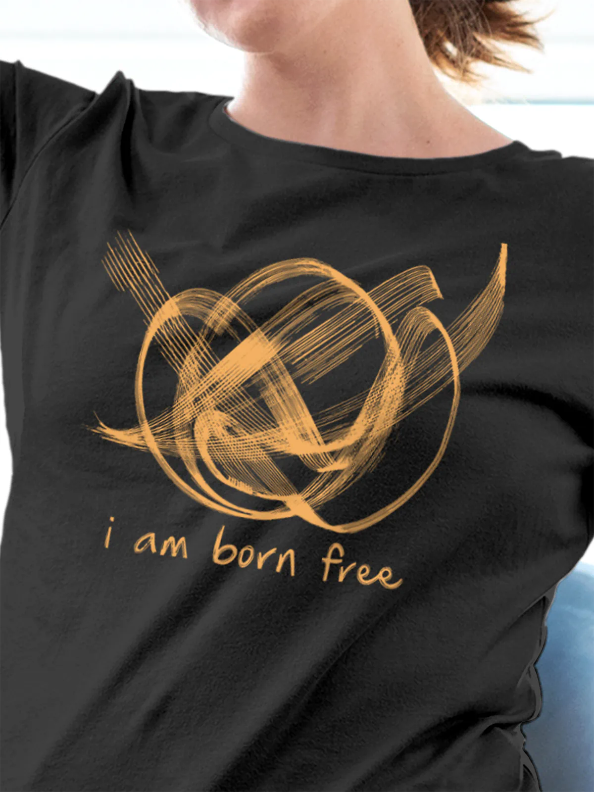 Close up of 'Born Free' design on Women's Dark Grey Round Neck T-shirt, highlighting intricate details and vibrant print.