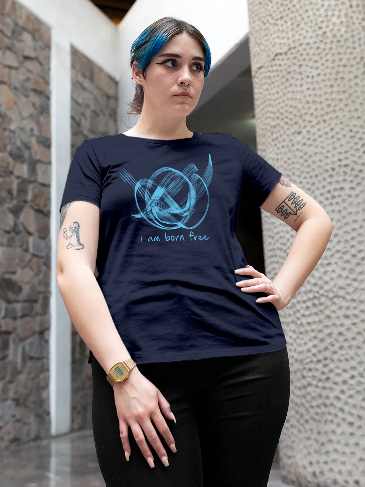 Model wearing Women's Navy Blue Round Neck T-shirt with 'Born Free' design, offering effortless style and premium comfort