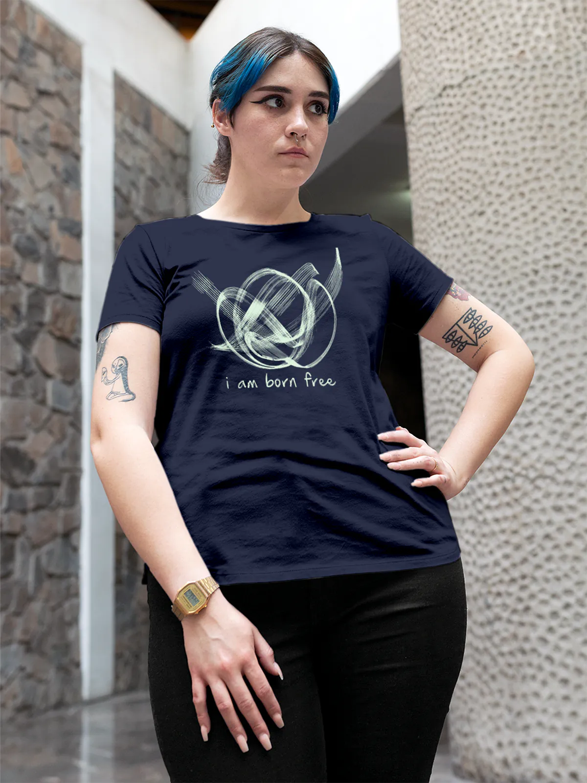 Model wearing Women's Navy Blue Round Neck T-shirt with 'Born Free' design, offering effortless style and premium comfort