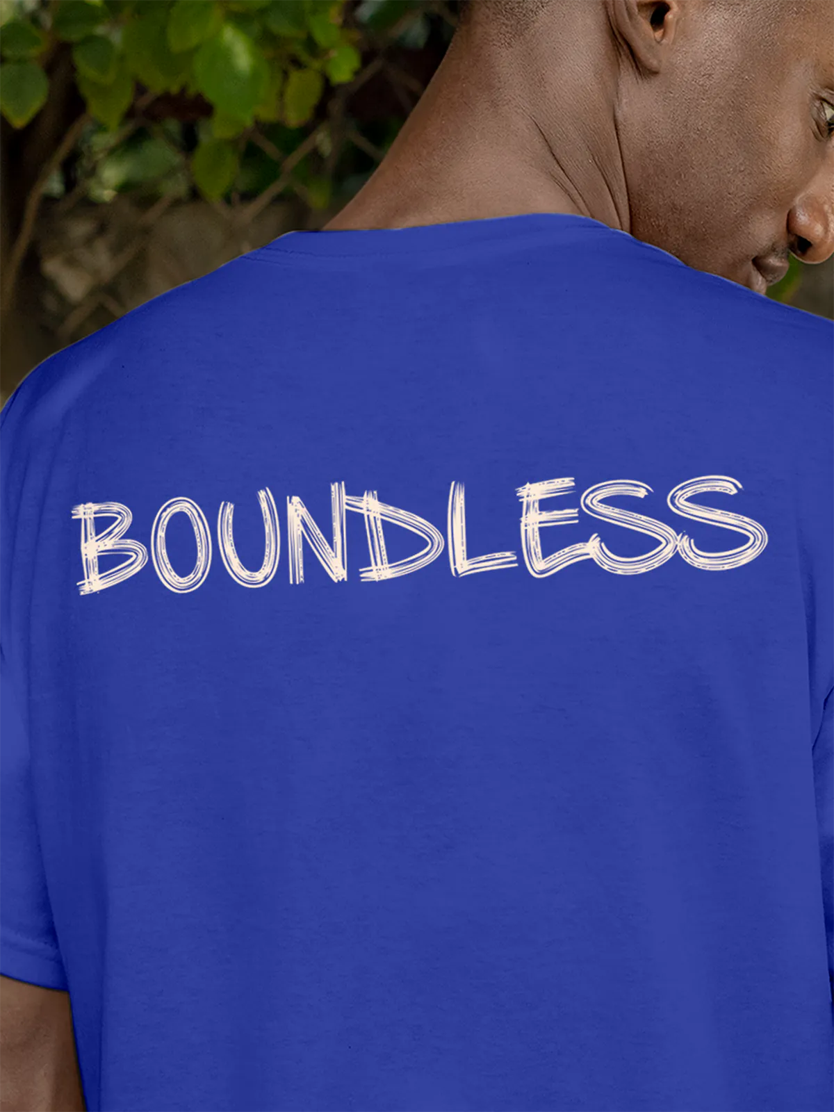 Close up of 'Boundless' design on Men's Blue Round Neck T-shirt, highlighting intricate details and vibrant print.