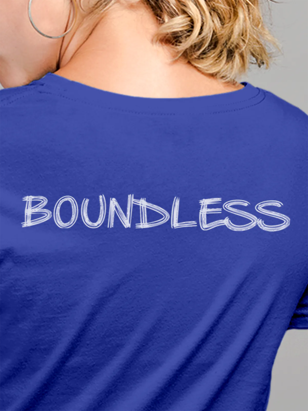 Close up of 'Boundless' design on Women's Blue Round Neck T-shirt, highlighting intricate details and vibrant print.