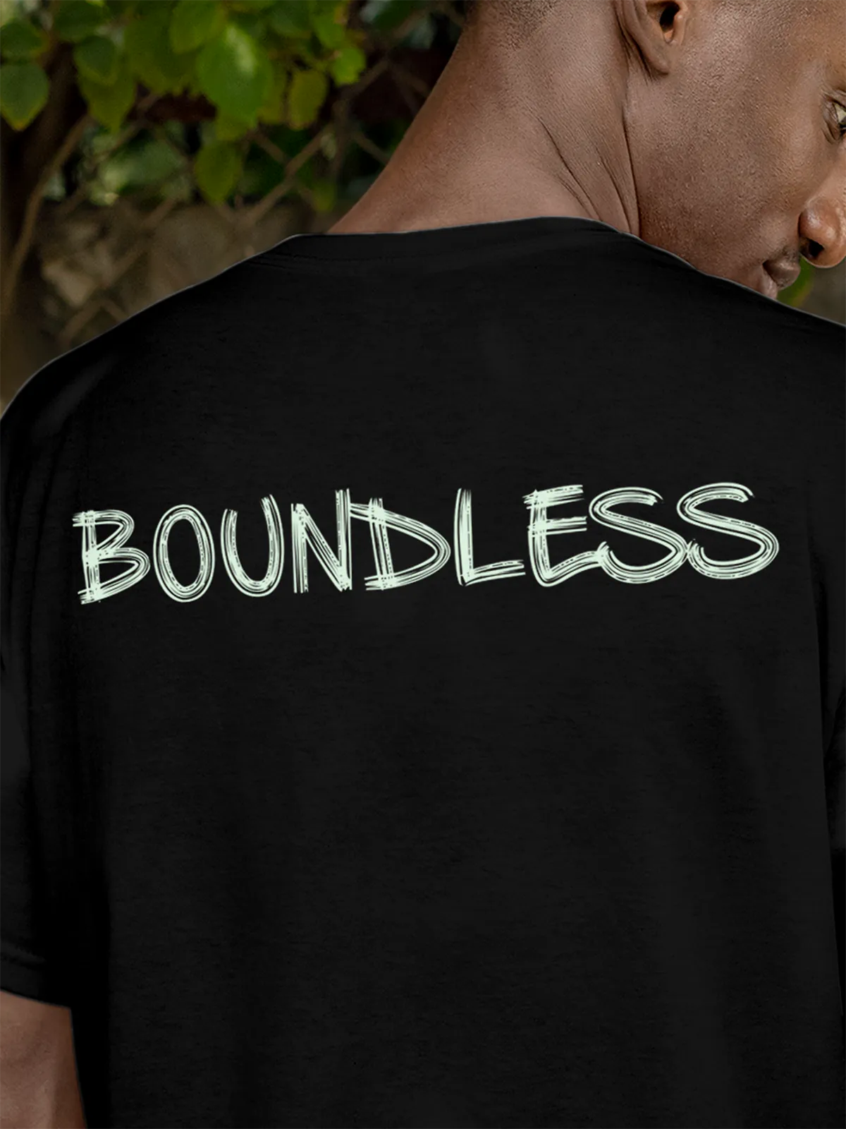 Close up of 'Boundless' design on Men's Black Round Neck T-shirt, highlighting intricate details and vibrant print.
