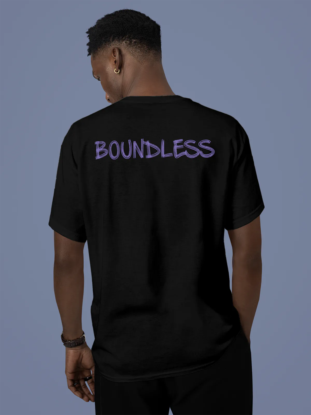 Model wearing Men's Black Round Neck T-shirt with 'Boundless' design, offering effortless style and premium comfort