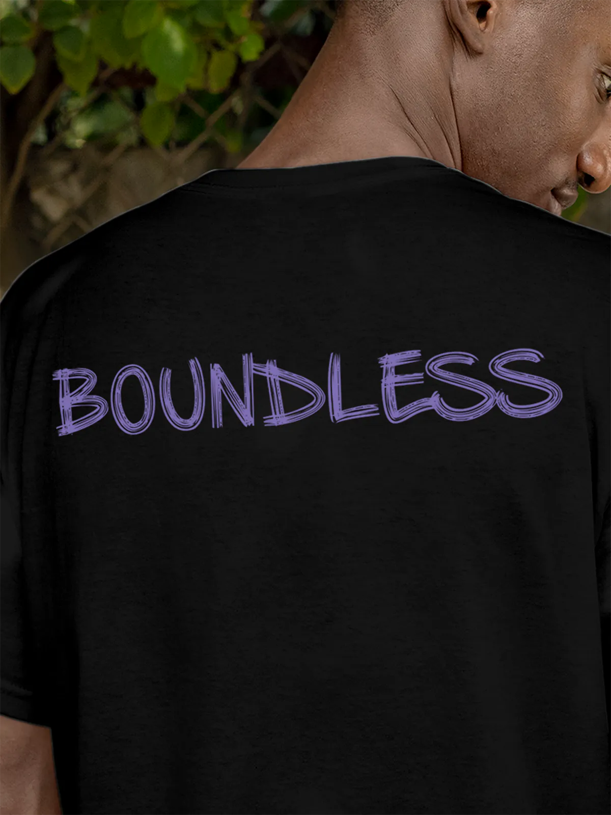 Close up of 'Boundless' design on Men's Black Round Neck T-shirt, highlighting intricate details and vibrant print.