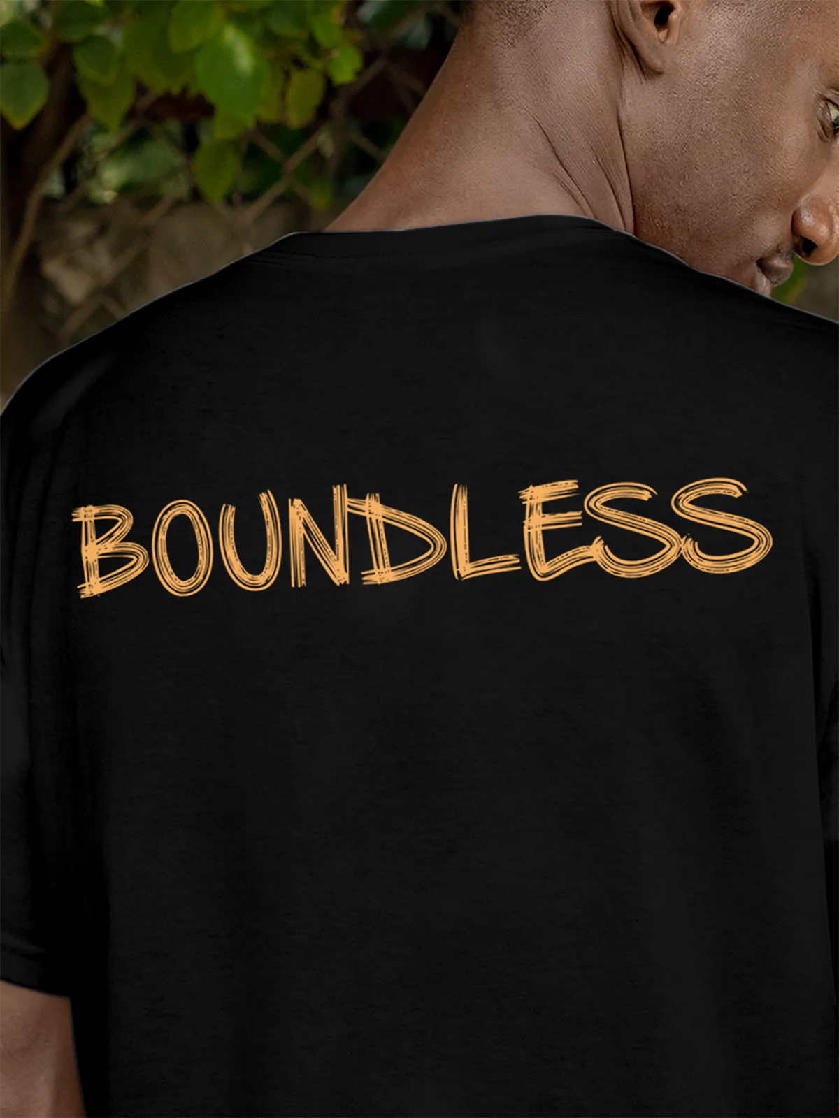 Close up of 'Boundless' design on Men's Black Round Neck T-shirt, highlighting intricate details and vibrant print.