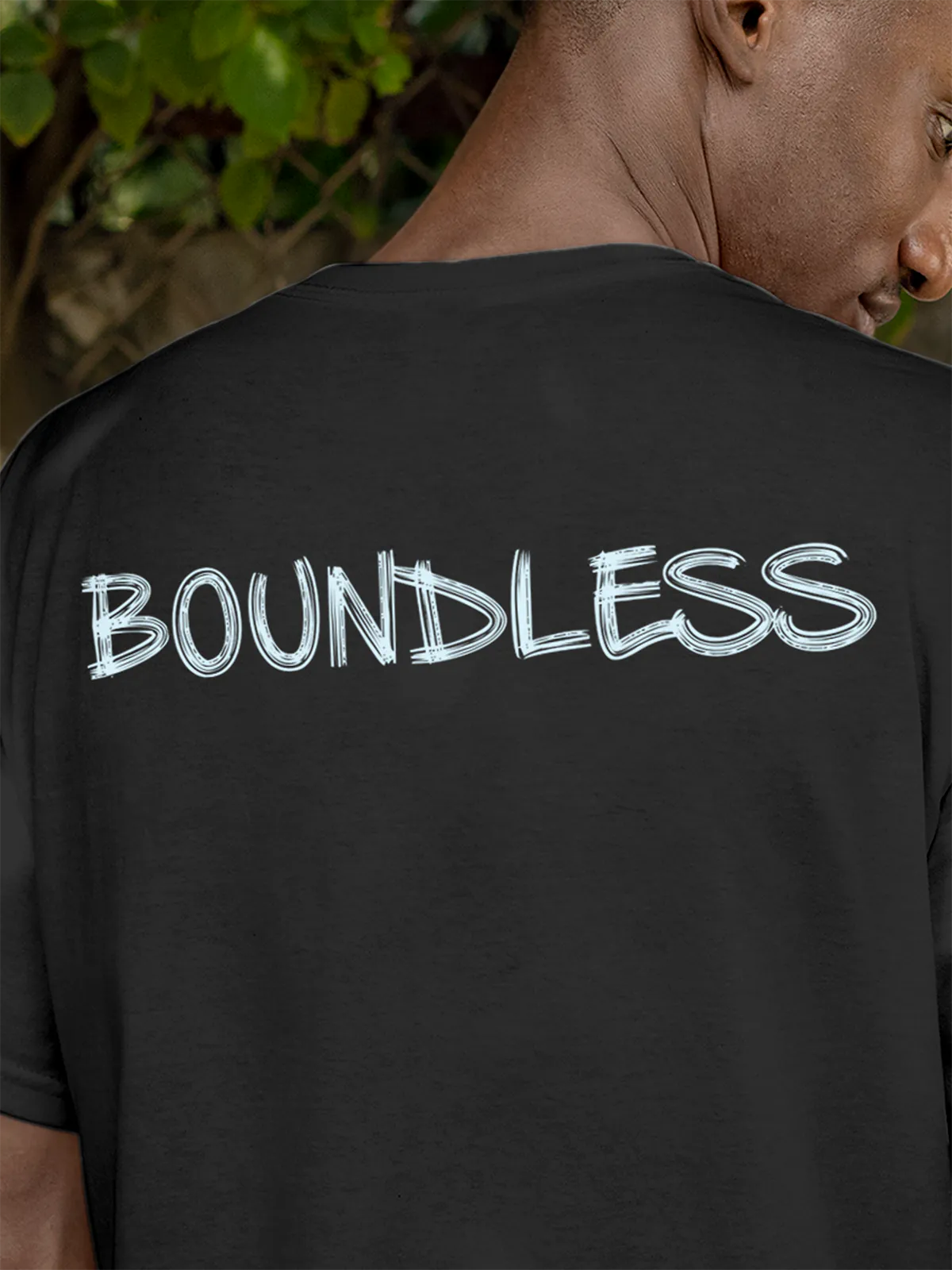 Close up of 'Boundless' design on Men's Dark Grey Round Neck T-shirt, highlighting intricate details and vibrant print.