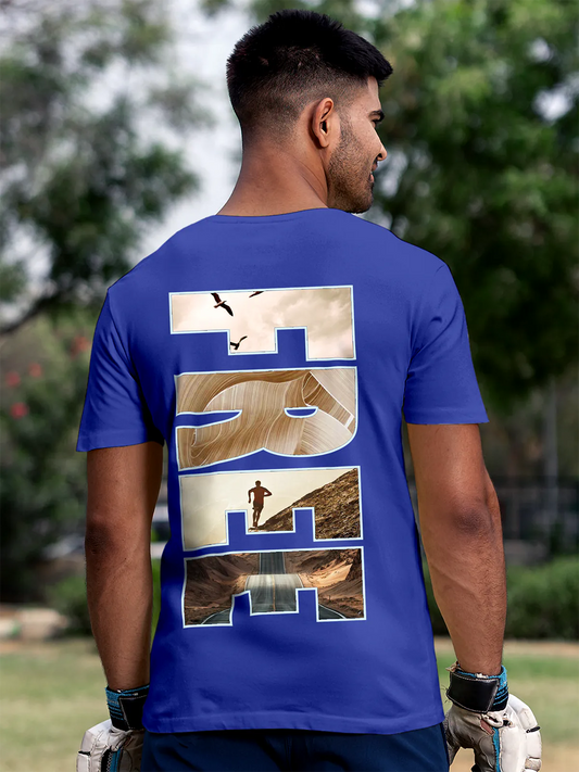 Fighterhero T-shirts: Model wearing Men's Blue Round Neck T-shirt with 'Free & Boundless' design